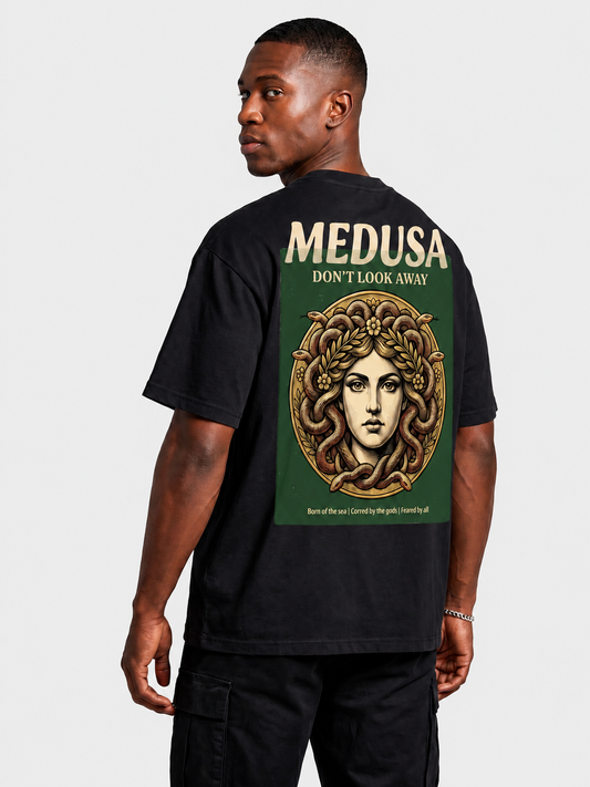 Medusa Don't Look Away oversized graphic tee in black by Apollo Moda, worn by model