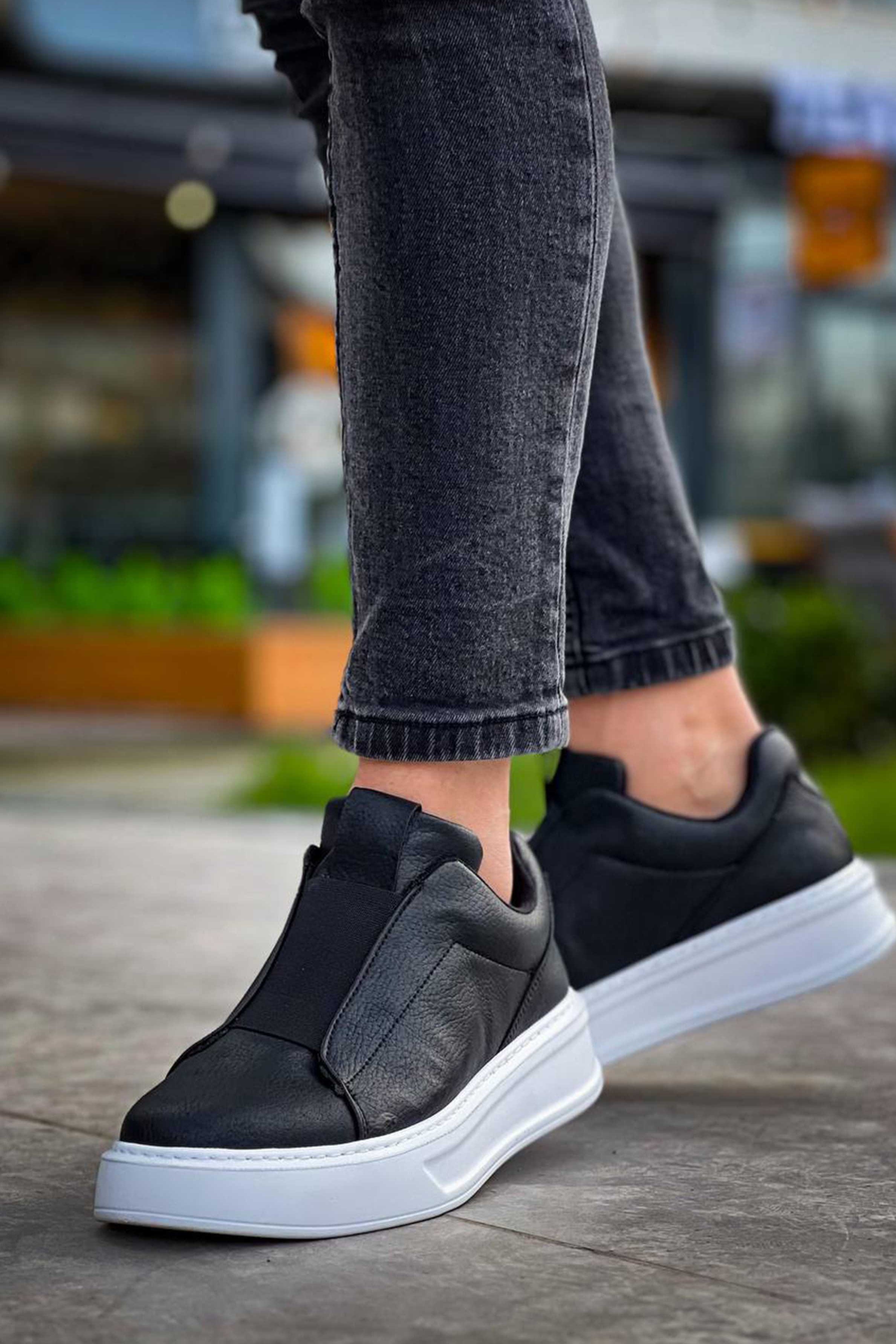 Izmir X-4 slip-on sneaker in black by Apollo Moda, view 7
