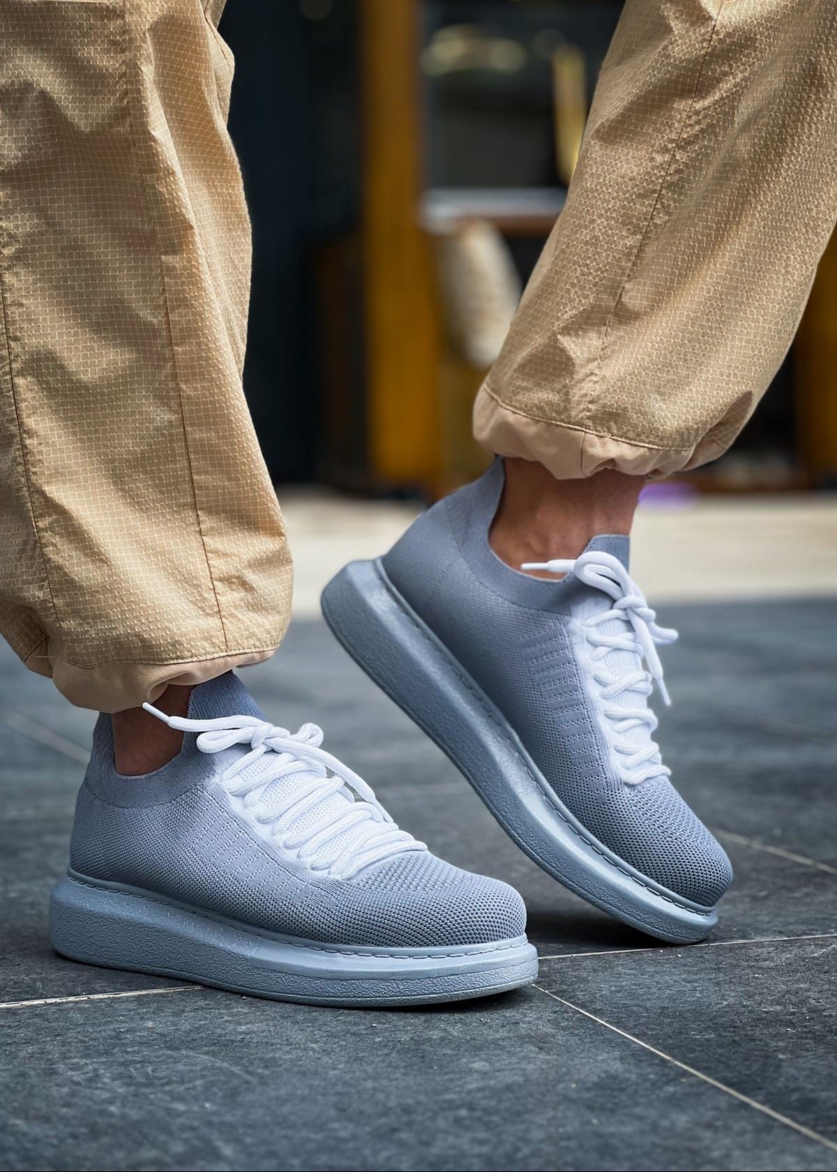 Torino Grey Peak knit sneaker in light grey with white laces by Apollo Moda